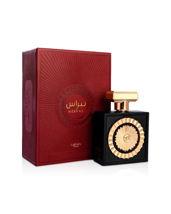 nebras perfume bottle beside box against white background.jpg